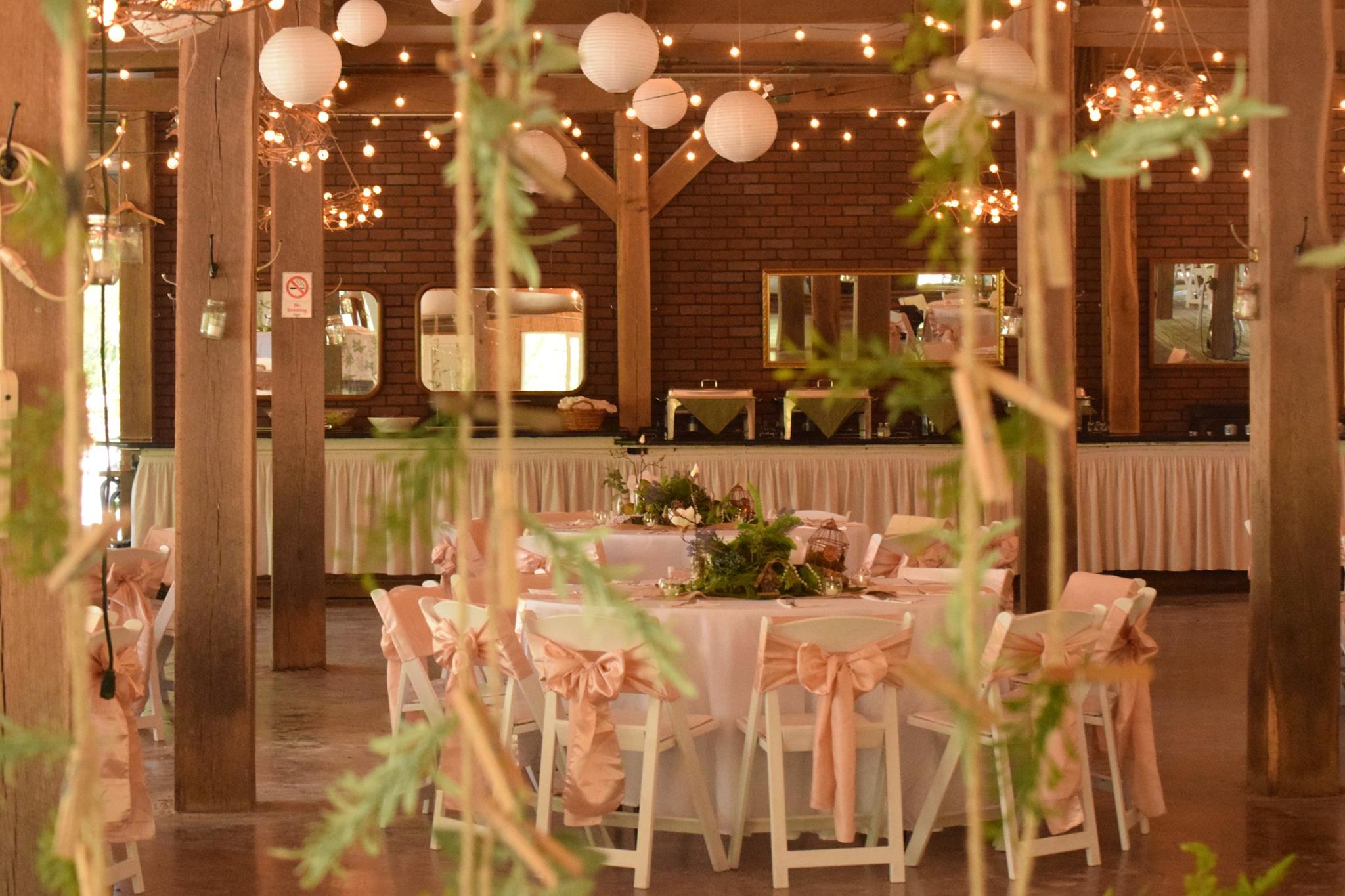 hanging greenery and twinkle light hanging wedding reception decor
