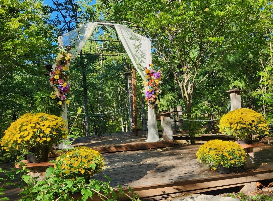 outdoor wedding ceremony in wooded garden